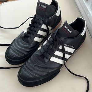 Adidas mundial goal shoes. Black with white stripes. Mens size 10.5